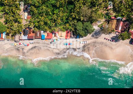 Bali, Indonesia: Aerial overhead view the whie sand Virgin beach and Candidasa in eastern Bali in the famous Indonesian island. Stock Photo