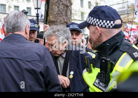 London, UK, 23rd April, 2024. A St George's Day rally, partly a celebration - and part protest, was held in Whitehall, attended by a large crowd of patriots, football supporters and others, bearing red and white flags and some in costume. Credit: Eleventh Hour Photography/Alamy Live News Stock Photo