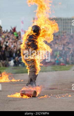 MOSCOW - AUG 25: Man on fire stunt shows on Festival of art and film stunt Prometheus in Tushino on August 25, 2012 in Moscow, Russia. The festival wa Stock Photo