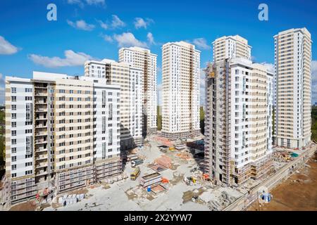 MOSCOW - APR 30: Buildings under construction of residential complex Elk Island, April 30, 2012, Moscow, Russia. This is 12-29 storey buildings with l Stock Photo