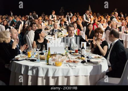 MOSCOW - APR 12: People sitting at the tables during Ceremony of rewarding of winners of an award Brand of year of EFFIE 2011, on April 12, 2012 in Mo Stock Photo