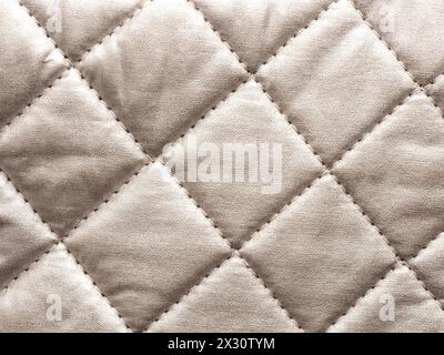 Close up of a texture of aluminum layered quilted fabric using as background  RECORD DATE NOT STATED Stock Photo