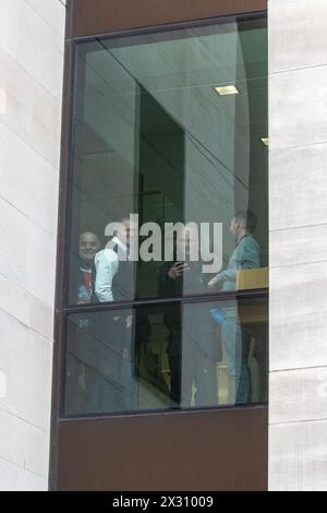 London, UK. 23rd April, 2024. Far-right activist Stephen Yaxley-Lennon, better known as Tommy Robinson, is pictured with supporters at Westminster Magistrates Court during a break in a hearing to establish whether he breached a dispersal order under Section 35 of the Crime and Policing Act 2014 during an antisemitism march in Westminster last November. A district judge acquitted him ruling that the power used against him by the Metropolitan Police had not been legally authorised. Credit: Mark Kerrison/Alamy Live News Stock Photo