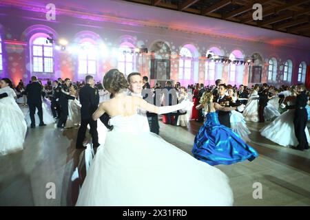 MOSCOW - FEB 22: Pairs of young people whirl in the dance, on February 22, 2013 in Moscow, Russia. Stock Photo