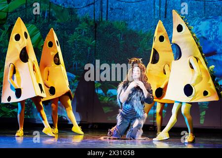 MOSCOW - DEC 15: Actors in roles of Ben Gunn and pieces of cheese on stage at Big Concert Hall Izmailovo during musical spectacle for children Treasur Stock Photo