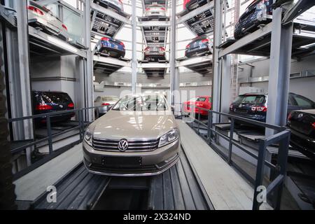 MOSCOW - JAN 11: Cars Volkswagen in the tower for storage and presentation in Varshavka Center on January 11, 2013, Moscow, Russia. The tower was desi Stock Photo