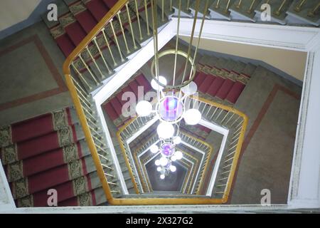 MOSCOW - NOV 21: Chandelier and spiral staircase in the Central Academic Theatre of the Russian Army, on Nov 21, 2012 in Moscow, Russia Stock Photo