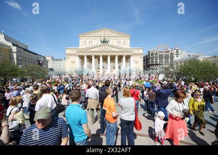 MOSCOW - MAY 9: People near Bolshoi theater, on May 9, 2013 in Moscow, Russia. Every year on square in front of Bolshoi Theater traditionally gather v Stock Photo