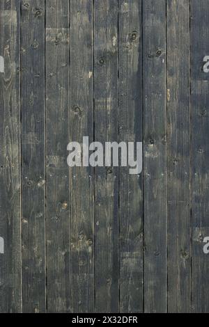 old dark painted wooden wall background Stock Photo