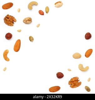Square shape background from various nuts and seeds with copy space for text. Isolated on white background. Flat lay, top view Stock Photo