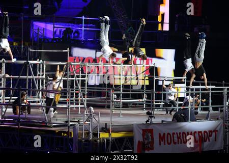 MOSCOW - MAR 02: Power exercises on the horizontal bar on the festival extreme sports Breakthrough 2013 in the arena of the Olympic Sports Complex, on Stock Photo