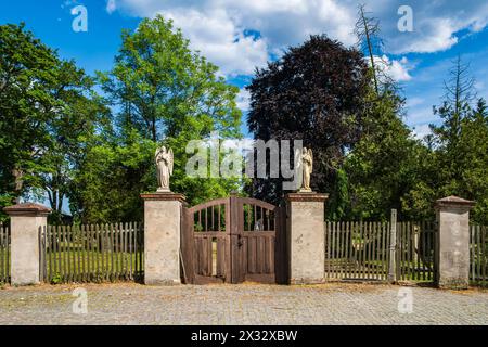 Entrance to the historic Protestant cemetery in Pokoj, Namyslow District, Opole Voivodeship, Upper Silesia, Poland. Stock Photo