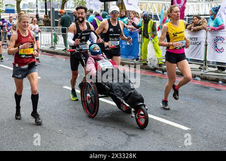 Eric Domingo Roldan pushing wheelchair whilst participating in the TCS ...