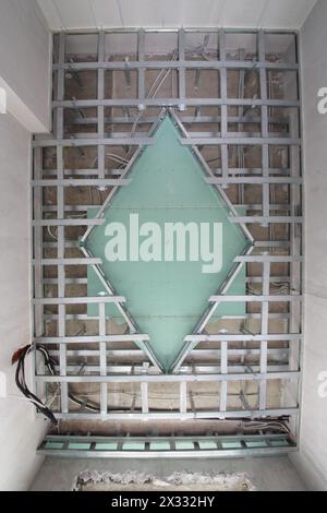 Metal frame to install decorative ceiling in the shape of lozenge Stock Photo