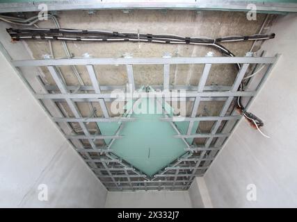 Split-level ceiling metall frame for plasterboard in lozenge shape Stock Photo