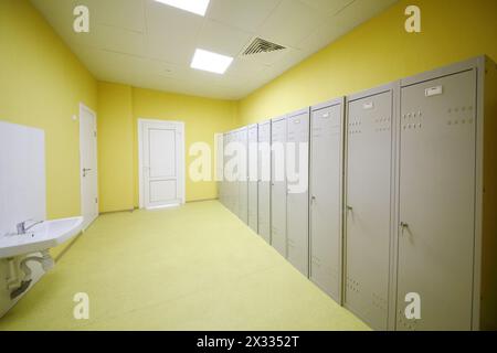 Lockers for class physical education in empty room in school. Stock Photo