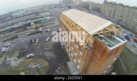 Brick building under construction in the city, aerial view Stock Photo