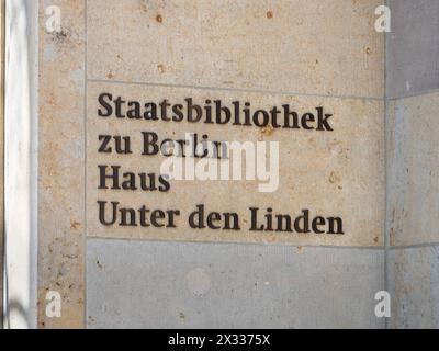 Staatsbibliothek zu Berlin (state library) at the Unter den Linden street. Sign at the building exterior of the historical house. Stock Photo