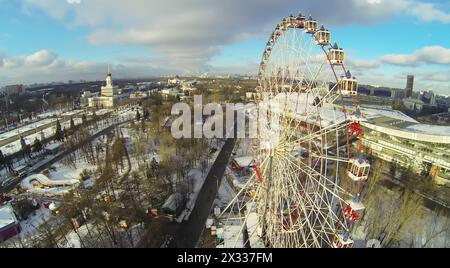 MOSCOW, RUSSIA - NOVEMBER 30, 2013: Amusement park and the Central Pavilion in Russia Exhibition Center, aerial view. The park was created in 1995 for Stock Photo