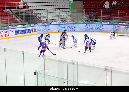 MOSCOW, RUSSIA - APR 26, 2014: Teams of children playing hockey at the Ice Palace of Sports Sokolniki Stock Photo