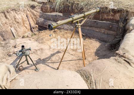 Mortar and grenade launcher in the trenches Stock Photo