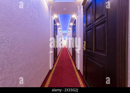 ADLER, RUSSIA - JULY 22, 2014: hotel corridor with many doors and carpet in Shine House hotel Stock Photo