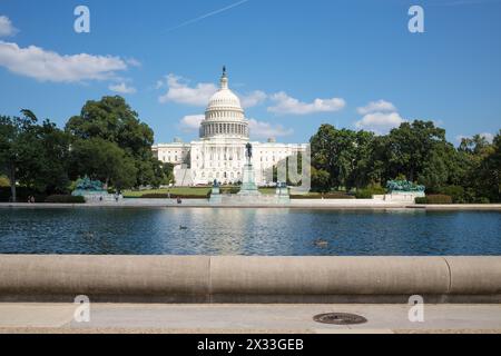 USA, WASHINGTON - AUG 26, 2014: Ulysses S. Grant Memorial near Capitol Reflecting Pool and United States Capitol at summer sunny day. Stock Photo