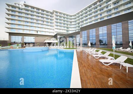 SOCHI, RUSSIA - JUL 27, 2014: Area of the Hotel Radisson Blu Paradise Resort and Spa near the outdoor pool Stock Photo