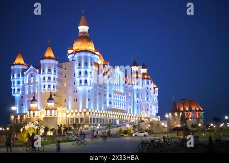 SOCHI, RUSSIA - JUL 27, 2014: Building of the Hotel Bogatyr in the style of a medieval castle in the evening Stock Photo