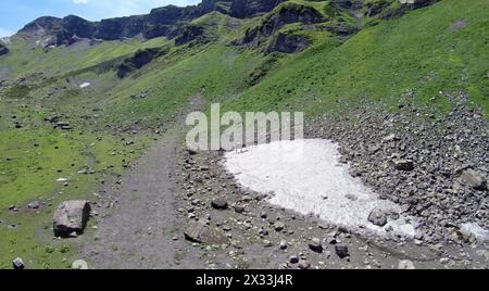 Beautiful mountain landscape of the Caucasus mountains with horses in summer, aerial view Stock Photo