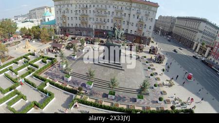 MOSCOW - AUG 12, 2014: Buildings of Moscow festival jam and Happy labyrinth on Tverskaya Square near the monument to Yuri Dolgoruky, aerial view Stock Photo