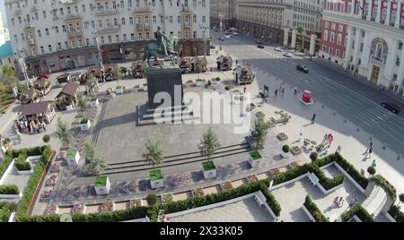 MOSCOW - AUG 12, 2014: Monument to Yuri Dolgoruky and Happy labyrinth of Moscow festival jam on Tverskaya Square, aerial view Stock Photo