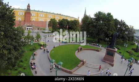 MOSCOW - AUG 12, 2014: Monument to Patriarch Hermogenes in the Alexander Garden against the wall of the Moscow Kremlin, aerial view Stock Photo