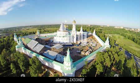 RUSSIA, MOSCOW – JUL 12, 2014: Complex of New-Jerusalem Monastery near road. Aerial view (Photo with noise from action camera) Stock Photo