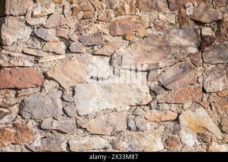 Very old stone wall, perfect for background.  Barcelona, Catalonia, Spain. Stock Photo