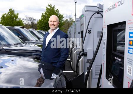 RETRANSMITTING AMENDING BY LINE EDITORIAL USE ONLY Simon Smith, Chief Commercial Officer, InstaVolt, attends the launch of InstaVolt's largest ultra-rapid electric vehicle (EV) charging hub in London, at Syon Park in Brentford, as the UK's largest charge point operator partners with The Licensed Taxi Drivers' Association (LTDA) to call for a VAT reduction on EV public charging. Picture date: Wednesday April 24, 2024. Stock Photo