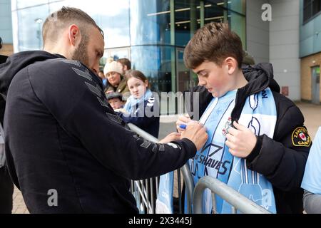 Coventry City's Liam Kelly signs autographs ahead of the Premier League match at Coventry Building Society Arena, Coventry. Picture date: Wednesday April 24, 2024. Stock Photo