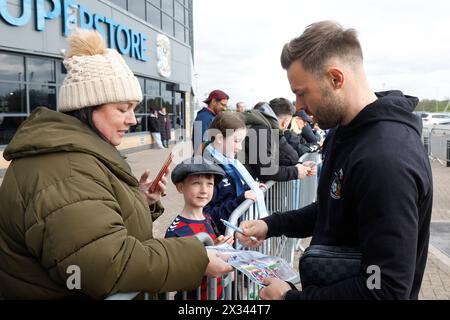 Coventry City's Matthew Godden signing autographs ahead of the Sky Bet Championship match at Coventry Building Society Arena, Coventry. Picture date: Wednesday April 24, 2024. Stock Photo