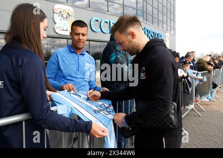 Coventry City's Matthew Godden signing autographs ahead of the Sky Bet Championship match at Coventry Building Society Arena, Coventry. Picture date: Wednesday April 24, 2024. Stock Photo