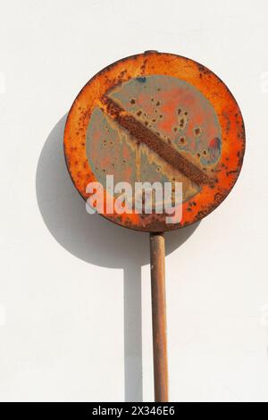Italy, Lombardy, Rusty No-parking Road Sign Stock Photo