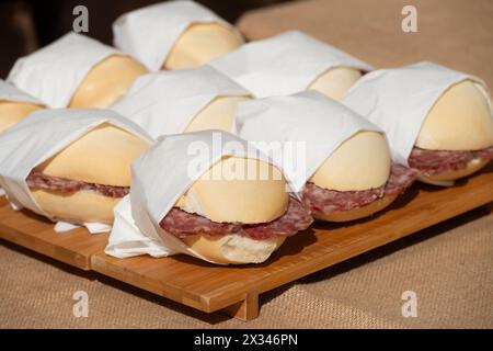 Italy, Lombardy, Crema, Festa del Salame Nobile Cremasco Festival, Salami Sandwichs Stock Photo