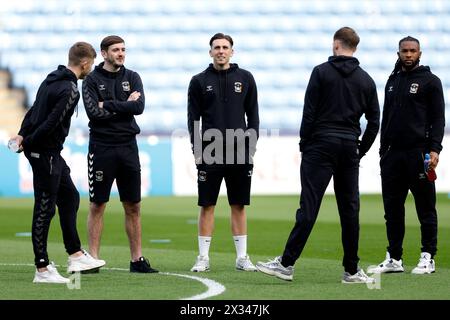 Coventry City's Luis Binks (centre) and team-mates inspect the pitch ahead of the Sky Bet Championship match at Coventry Building Society Arena, Coventry. Picture date: Wednesday April 24, 2024. Stock Photo