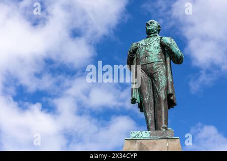 Reykjavik, Iceland, 14.05.22. Statue of scholar and independence leader Jon Sigurdsson by Einar Jonsson on Austurvollur square, against blue sky. Stock Photo