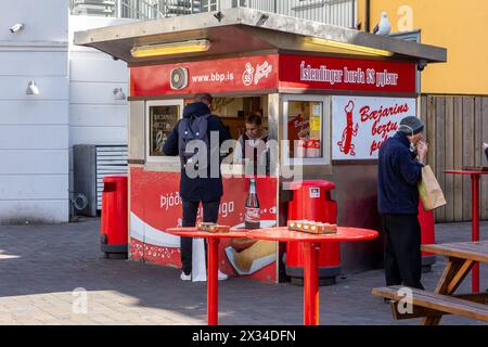 Reykjavik, Iceland, 14.05.22. The most famous red hot dog stand 'Pulsa' in Iceland on Baejarins Beztu in downtown Reykjavik with people. Stock Photo