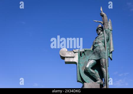 Reykjavik, Iceland, 14.05.22. Ingolfr Arnarson statue by Einar Jonsson on Arnarholl hill in Reykjavik, against blue sky, copy space. Stock Photo