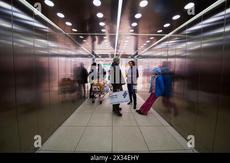 MOSCOW, RUSSIA - APR 02, 2016: Elevator cabin with passengers in Aviapark trade center at Hodynskiy boulevard. Aviapark total area of 390 000 sq.m., s Stock Photo