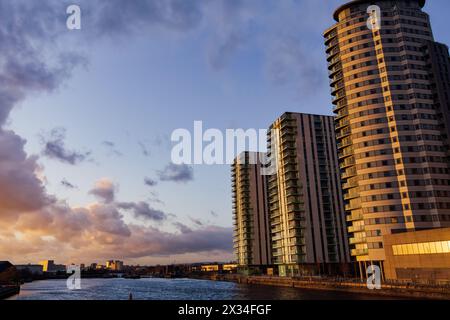 Manchester, UK The Lightbox and The Heart apartment blocks across Salford Quays in MediaCity. Stock Photo