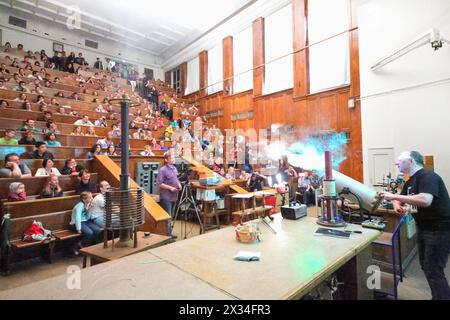 MOSCOW, RUSSIA - JUN 06, 2014: Teacher shows students scientific experiment during lecture in auditorium in Moscow State University. Stock Photo