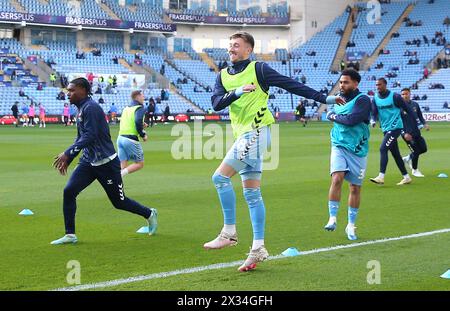 Coventry City's Josh Eccles (centre) and team-mates warming up prior to kick-off before the Sky Bet Championship match at Coventry Building Society Arena, Coventry. Picture date: Wednesday April 24, 2024. Stock Photo