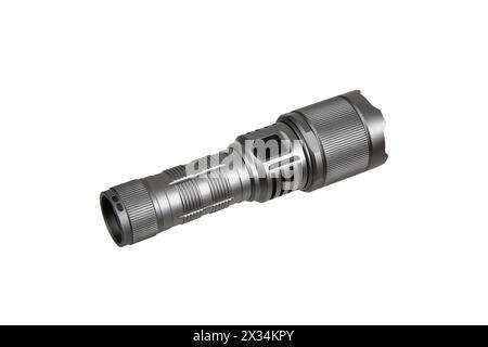Modern metal LED flashlight in gray color. Portable flashlight isolate on a white background. Stock Photo
